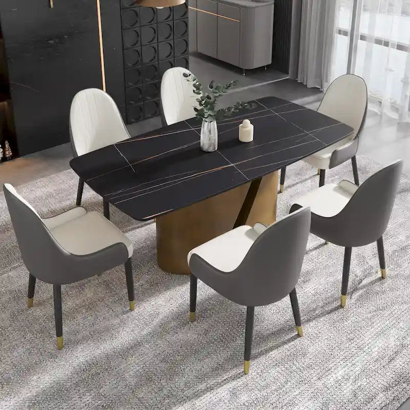 Table de salle à manger moderne en marbre avec plateau en pierre frittée et pieds en métal finition or
