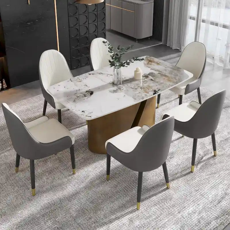 Table de salle à manger moderne en marbre avec plateau en pierre frittée et pieds en métal finition or