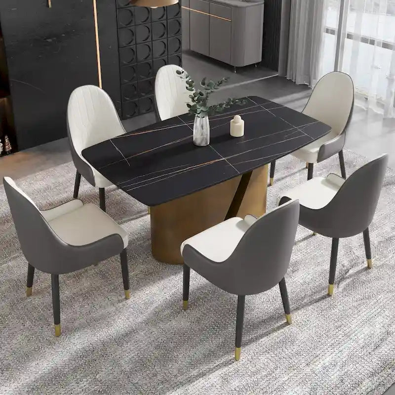 Table de salle à manger moderne en marbre avec plateau en pierre frittée et pieds en métal finition or