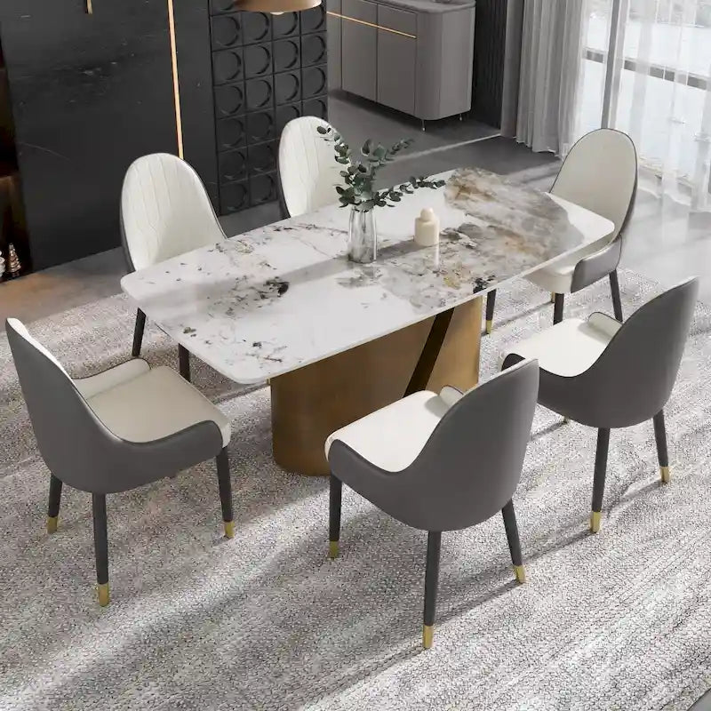 Table de salle à manger moderne en marbre avec plateau en pierre frittée et pieds en métal finition or