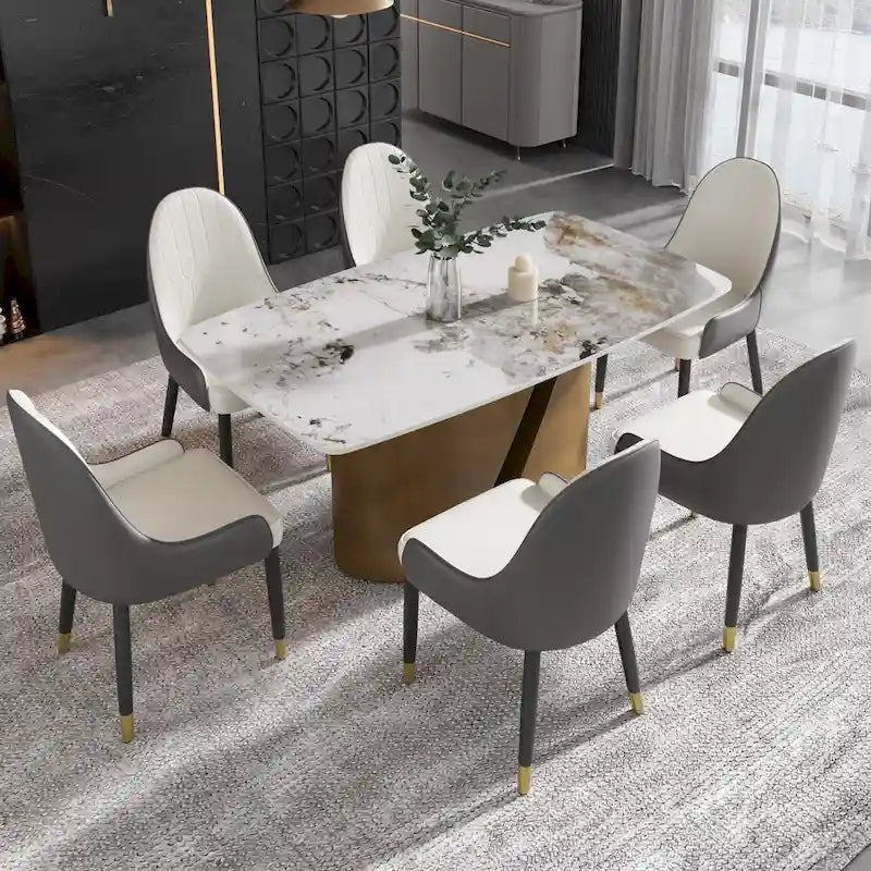 Table de salle à manger moderne en marbre avec plateau en pierre frittée et pieds en métal finition or