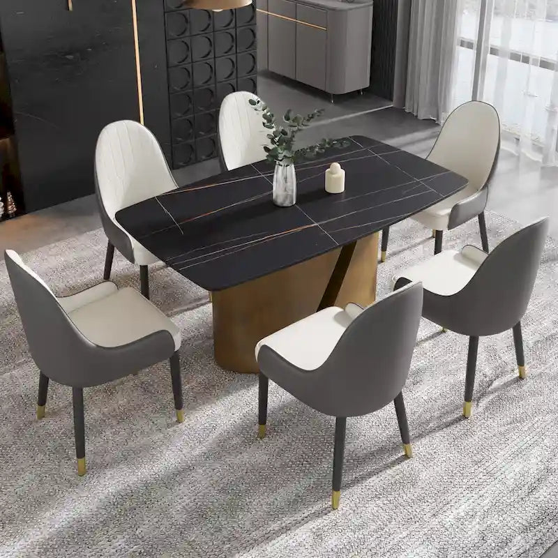 Table de salle à manger moderne en marbre avec plateau en pierre frittée et pieds en métal finition or